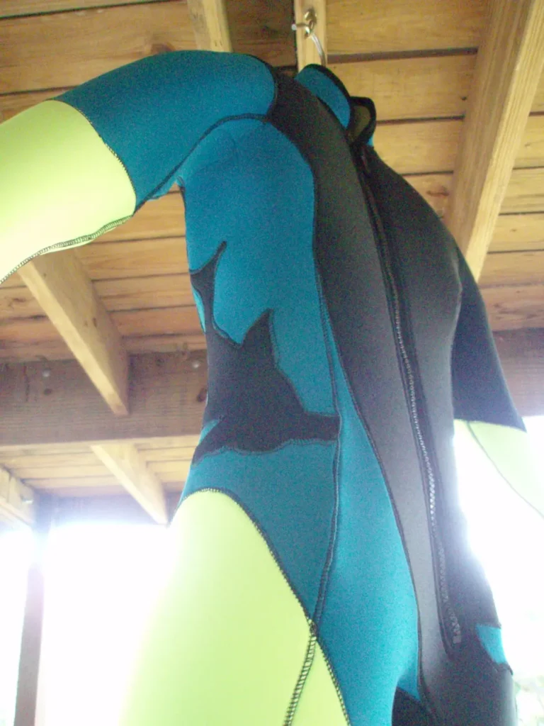 The Custom Neoprene One Piece Jumpsuit Hanging To The Hook